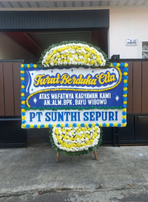 Papan Bunga Duka di Gang Buntu