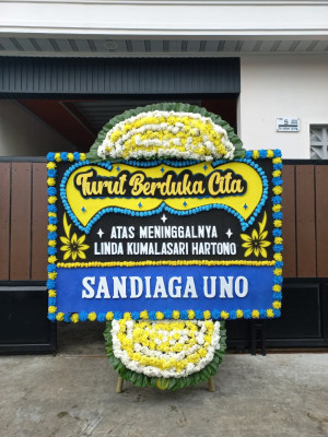 Papan Bunga Duka di Gang Buntu